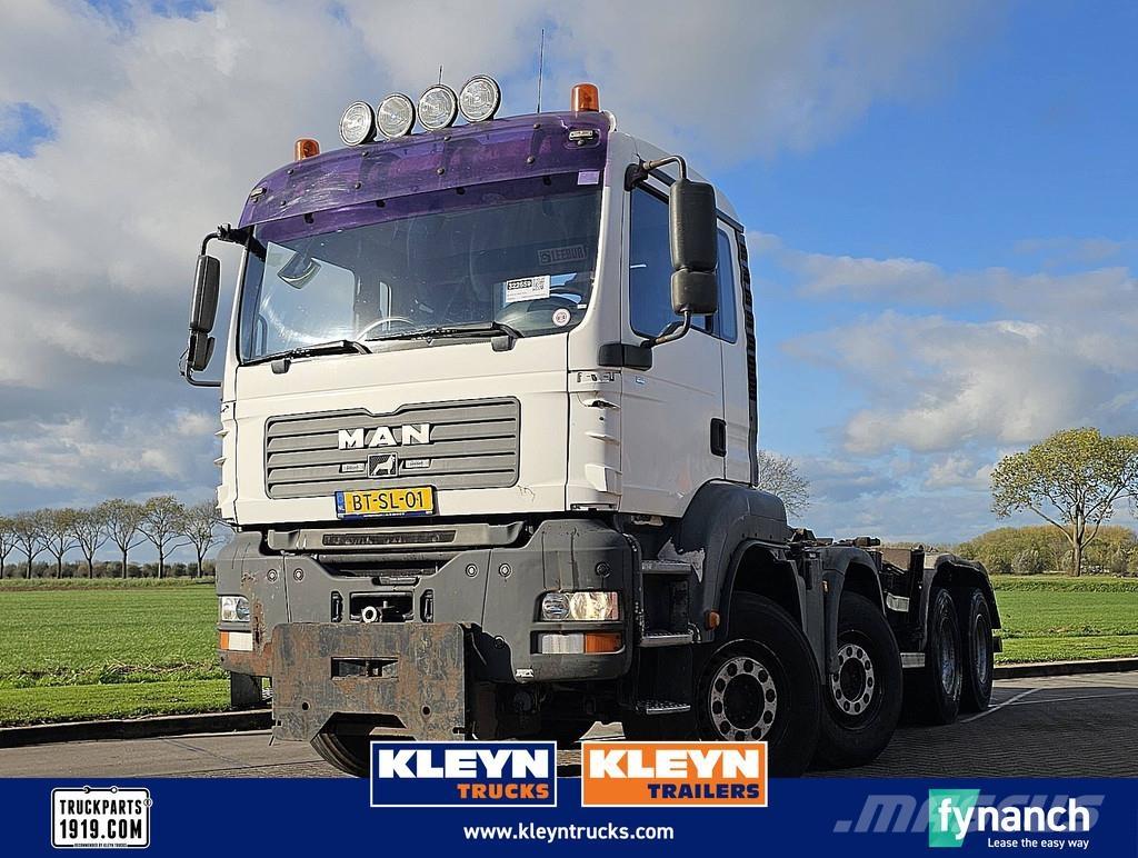 MAN 41.400 TGA Rol kiper kamioni sa kukom za podizanje tereta