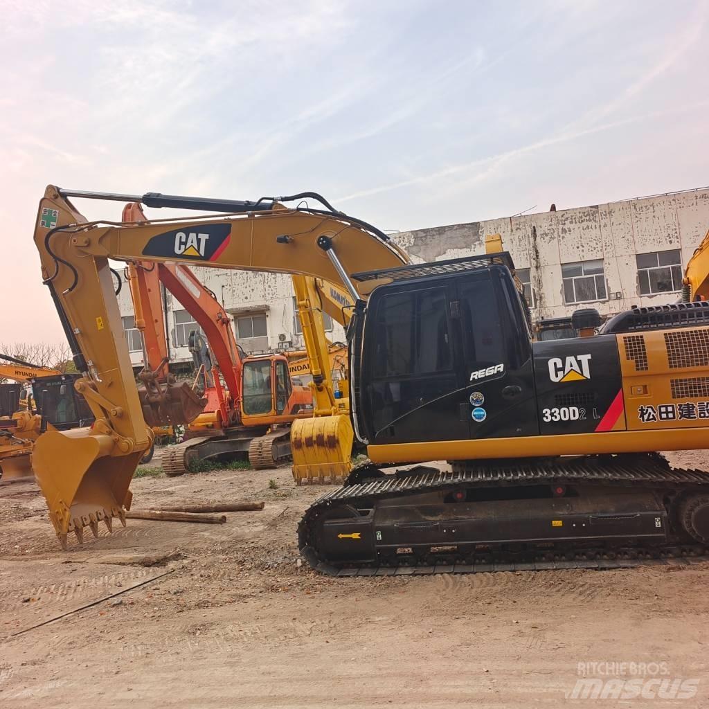 CAT 324DL Bageri guseničari