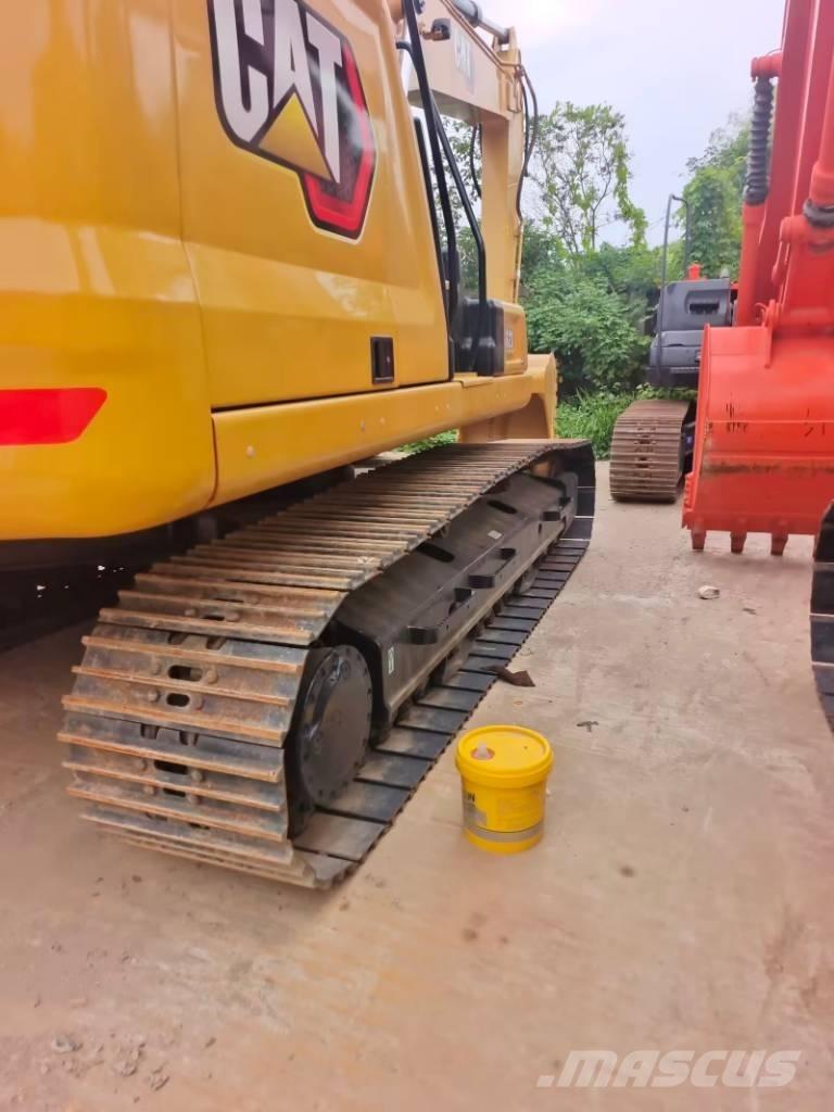 CAT 323  GC Bageri guseničari