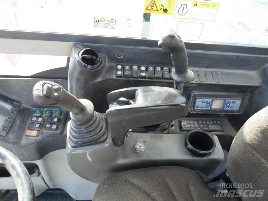 Takeuchi TB 295 W Bageri točkaši