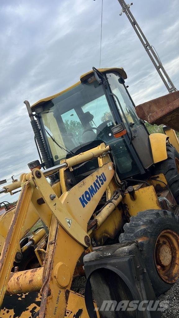 Komatsu WB 93 R Osovine