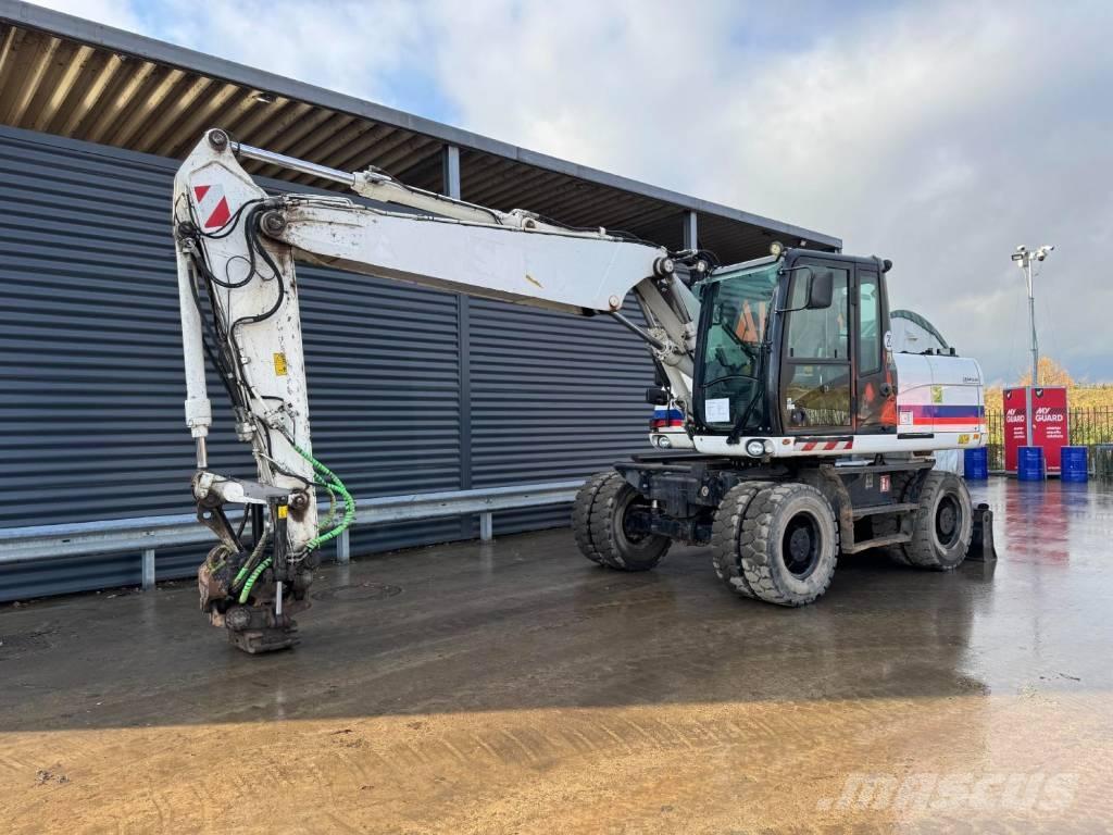 CAT M315D Bageri točkaši