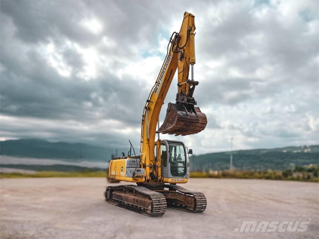 New Holland E 245 B Bageri guseničari