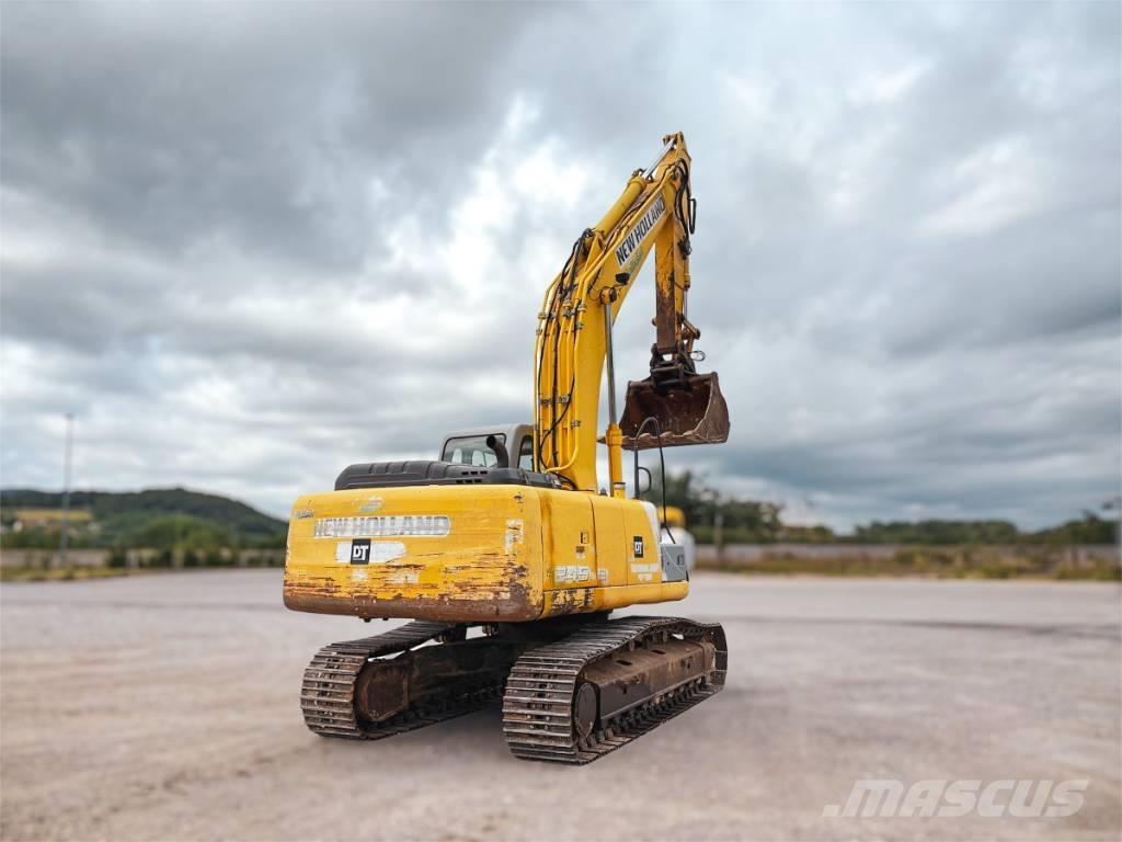 New Holland E 245 B Bageri guseničari