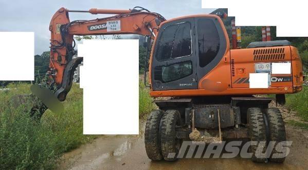 Doosan DX 140 W Bageri točkaši
