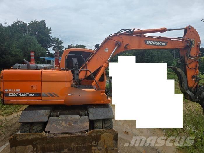 Doosan DX 140 W Bageri točkaši