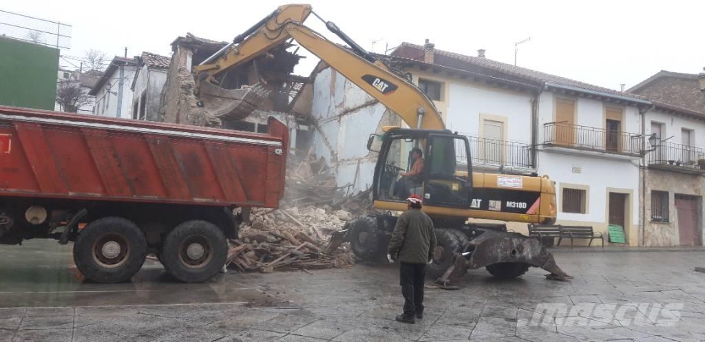 CAT M318d Bageri točkaši