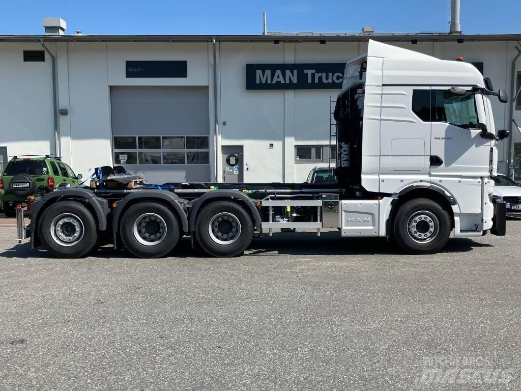 MAN TGX 35.520 Rol kiper kamioni sa kukom za podizanje tereta