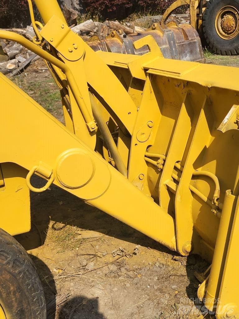 CAT 426B Rovokopači