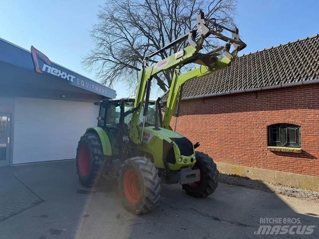 CLAAS Axos 330 Traktori