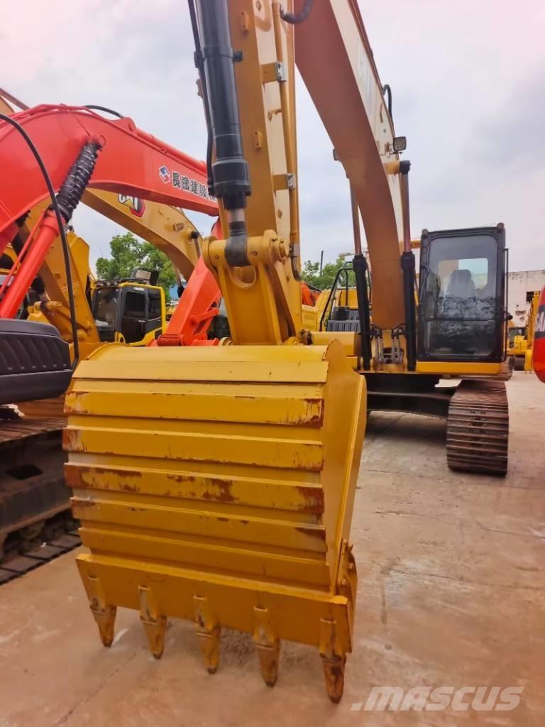 CAT 323 GC Bageri guseničari