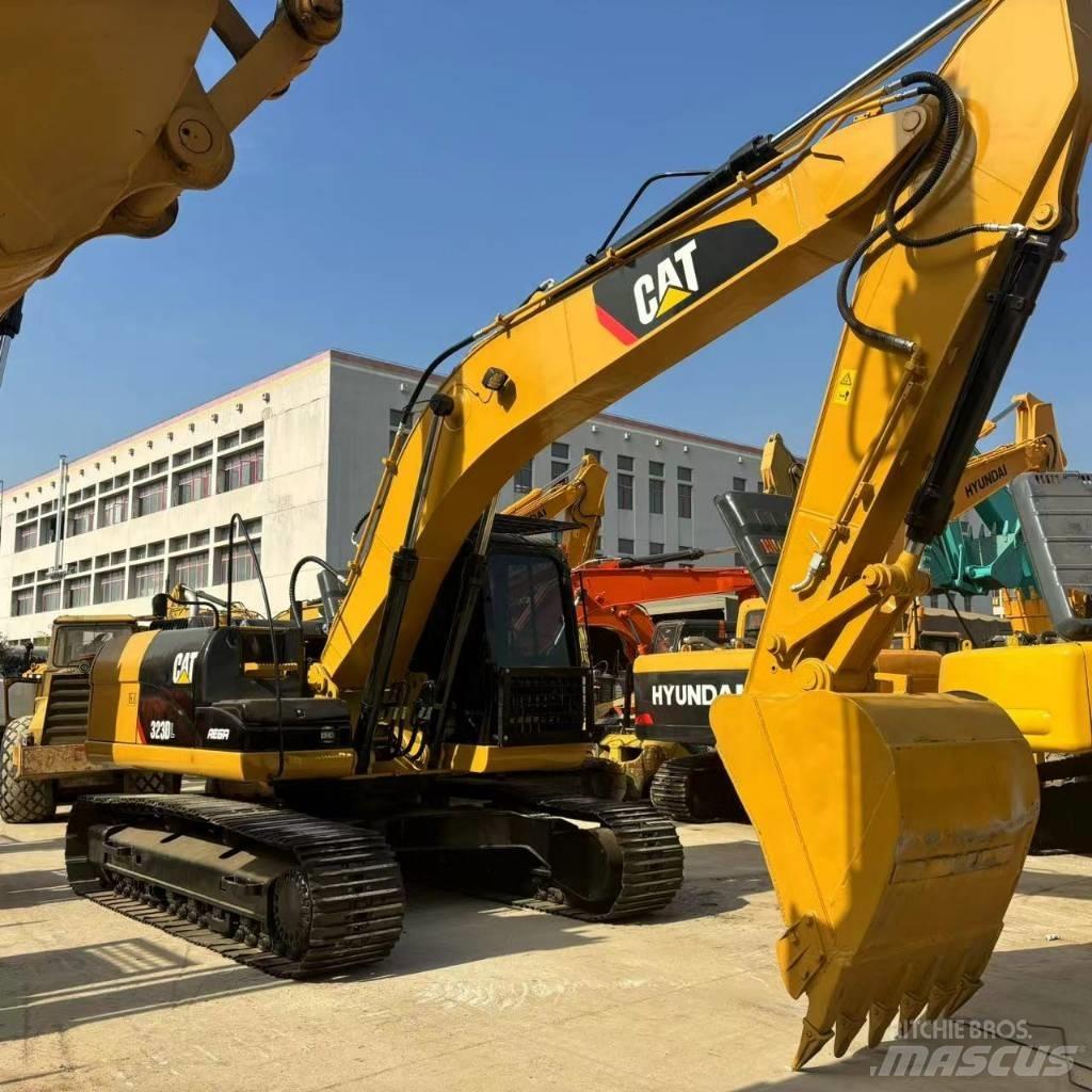 CAT 323 D L Bageri guseničari