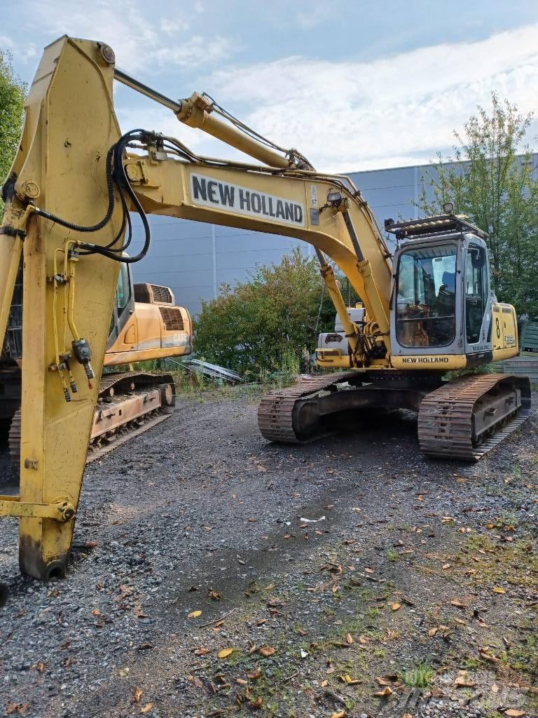 New Holland E 215 B Bageri guseničari