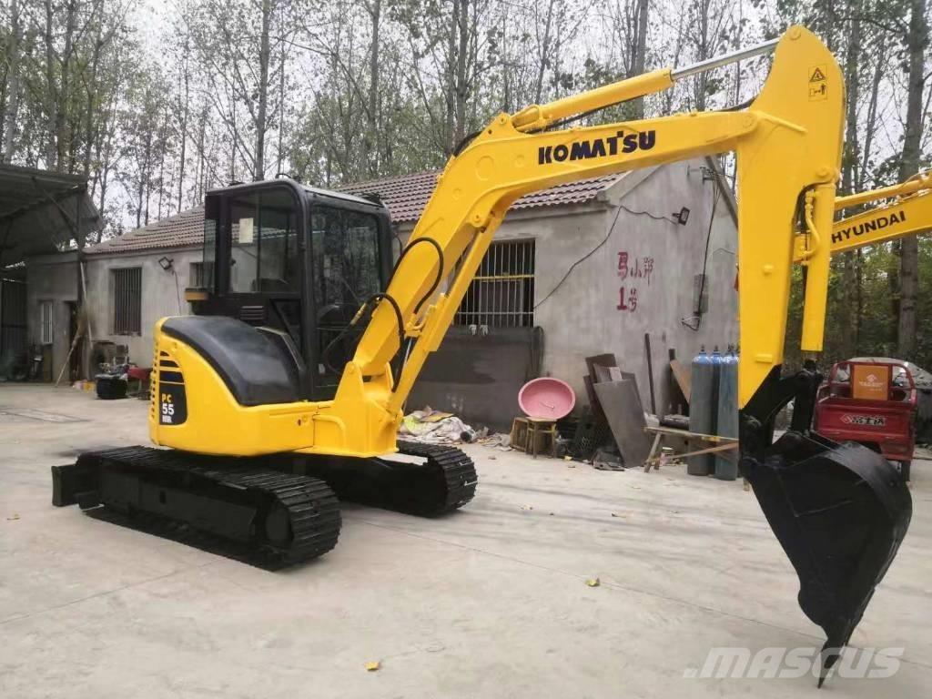 Komatsu pc55mr Bageri guseničari
