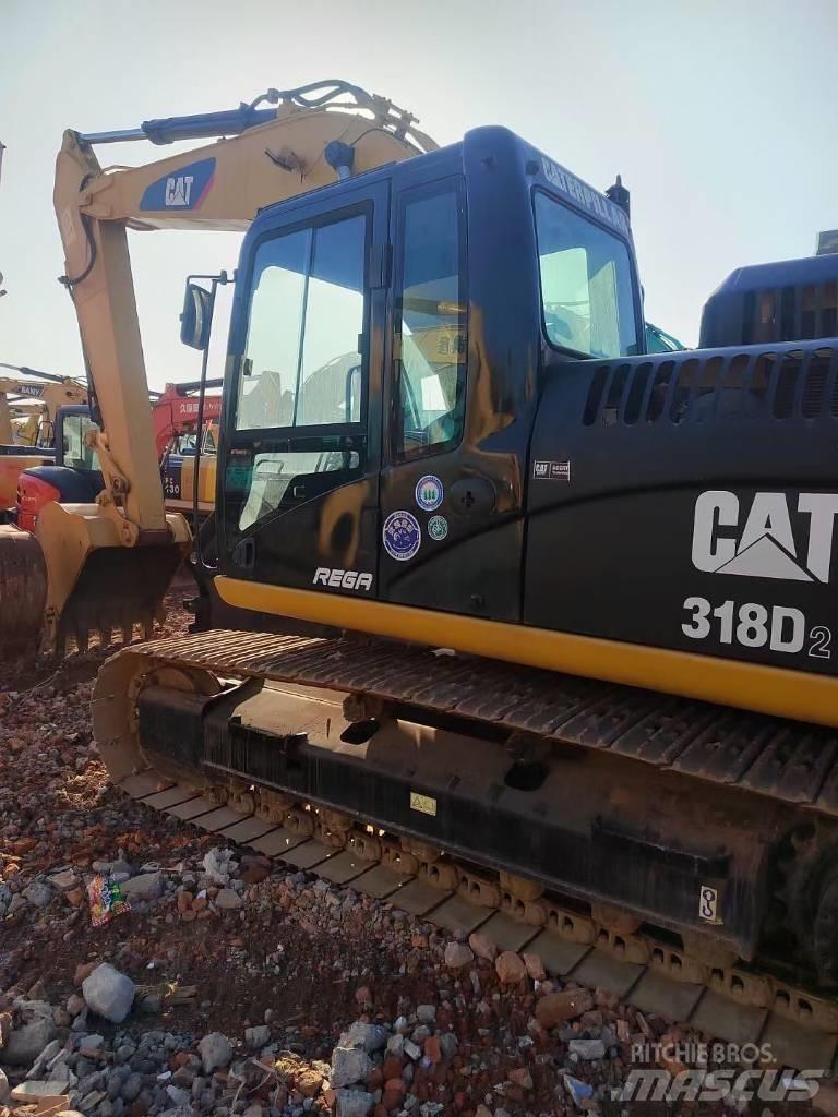 CAT 318 Bageri guseničari