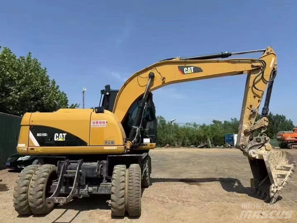 CAT M 315 D Bageri točkaši
