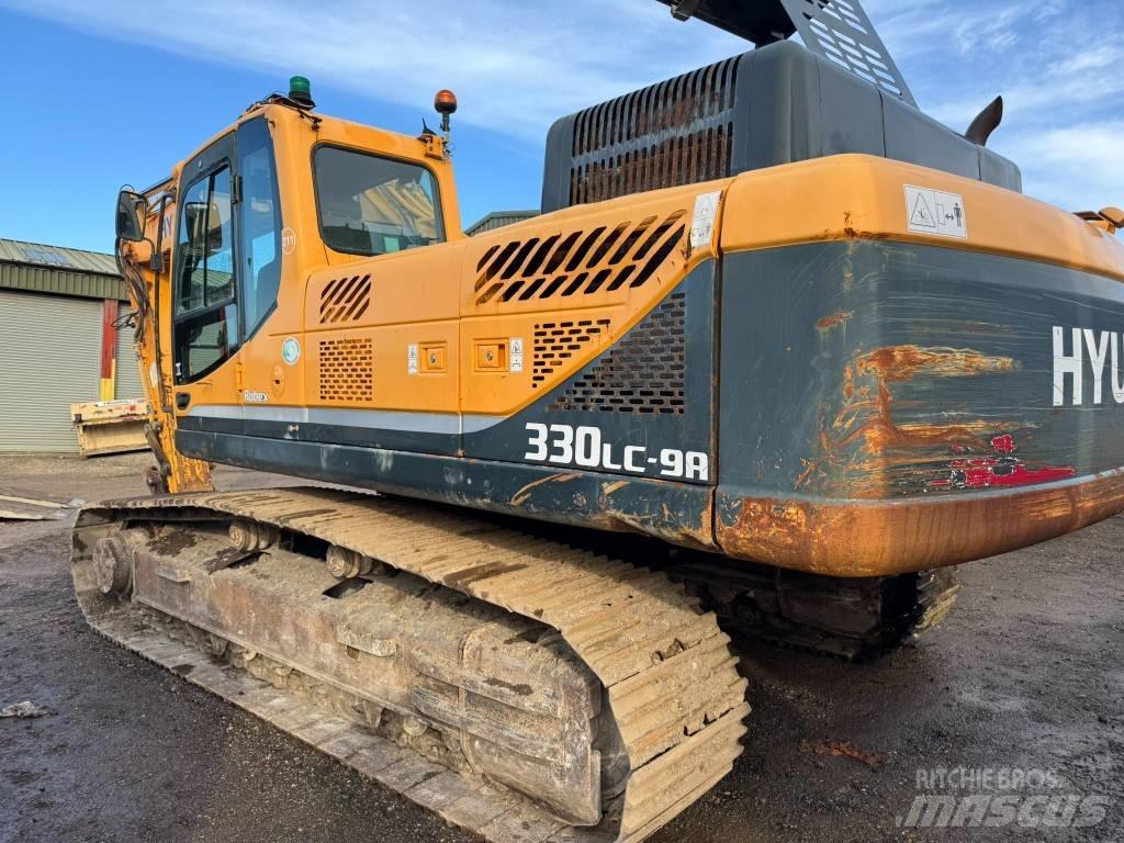 Hyundai R330 Bageri guseničari