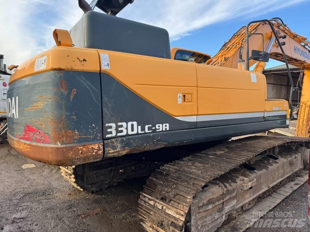 Hyundai R330 Bageri guseničari