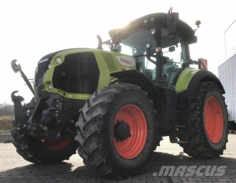 CLAAS AXION 810 Traktori