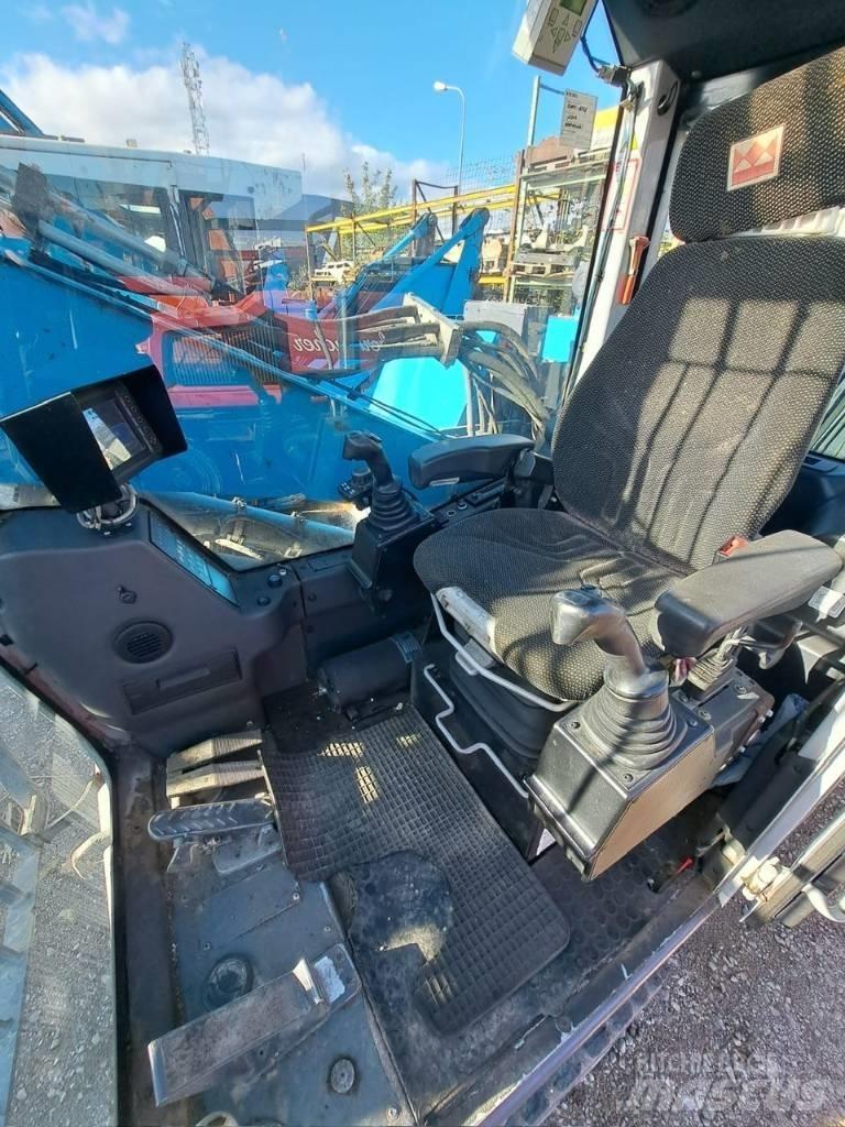 Fuchs MHL 320 Bageri za prenos primarnih/sekundarnih sirovina