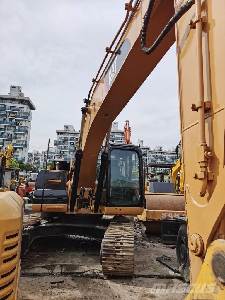 CAT 323D Bageri guseničari