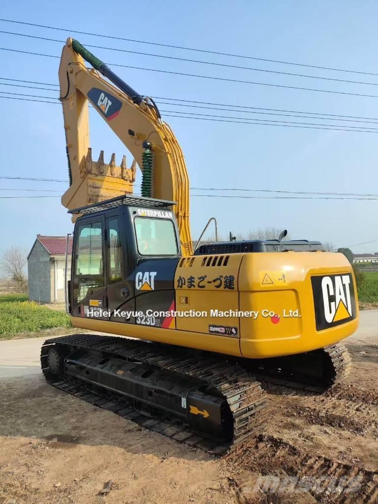 CAT 323 Bageri guseničari