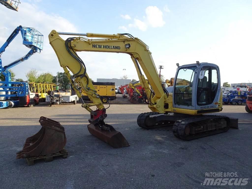 New Holland E80 Bageri guseničari