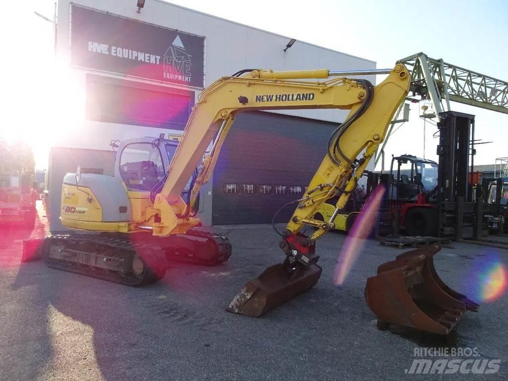 New Holland E80 Bageri guseničari
