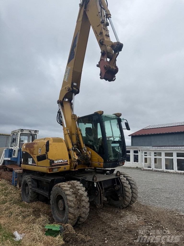 CAT M 313 C Bageri točkaši