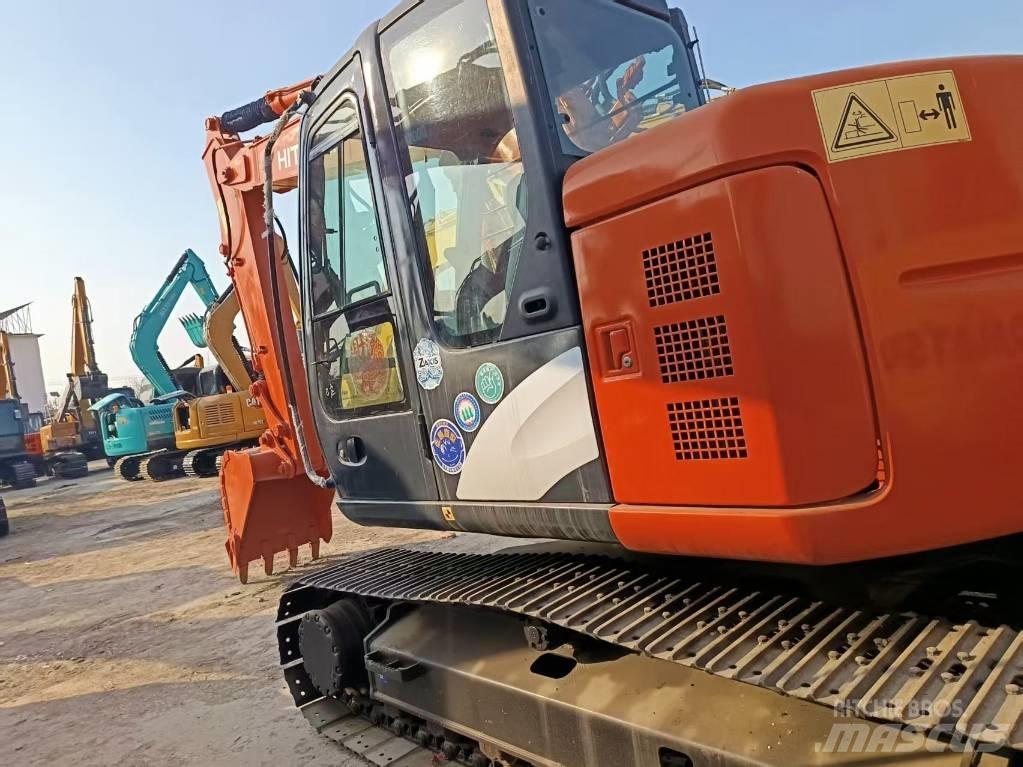 Hitachi ZX135 Bageri guseničari