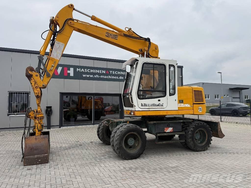 Liebherr A 312 Bageri točkaši