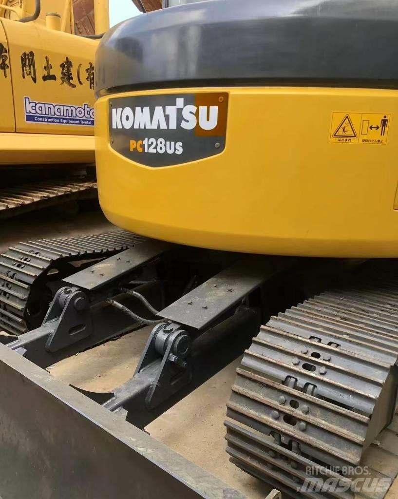Komatsu 128 US Bageri guseničari