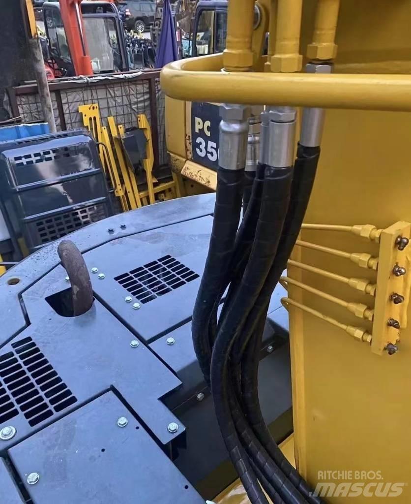 Komatsu 128 US Bageri guseničari