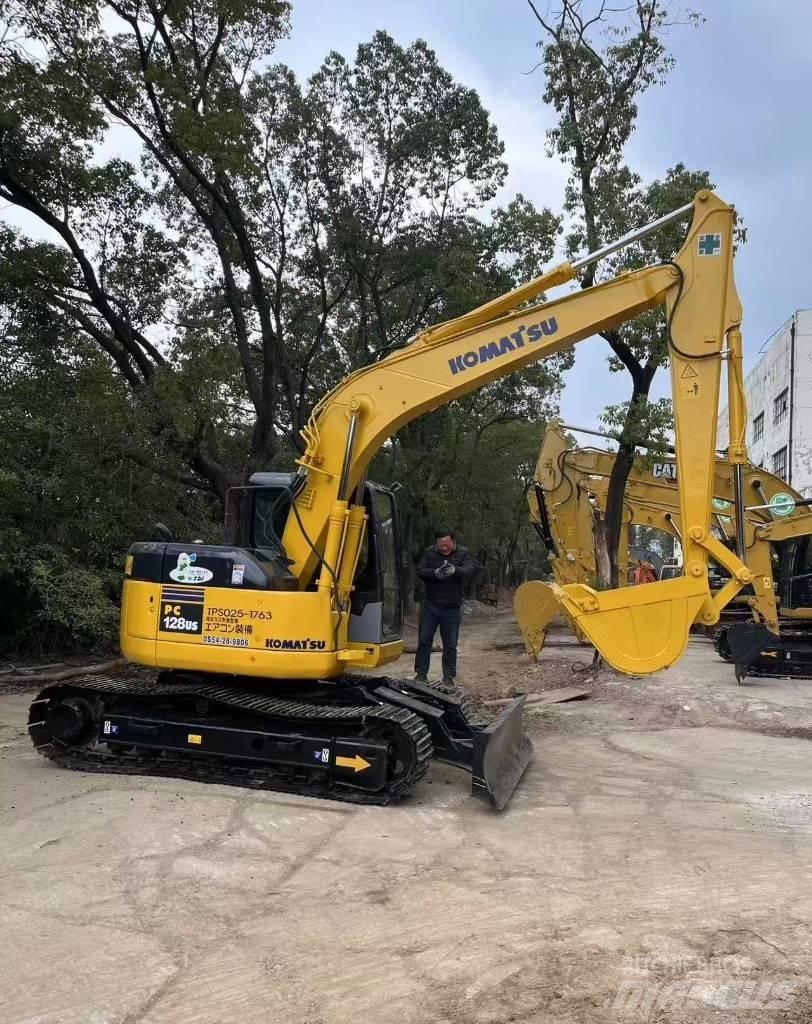 Komatsu 128 US Bageri guseničari