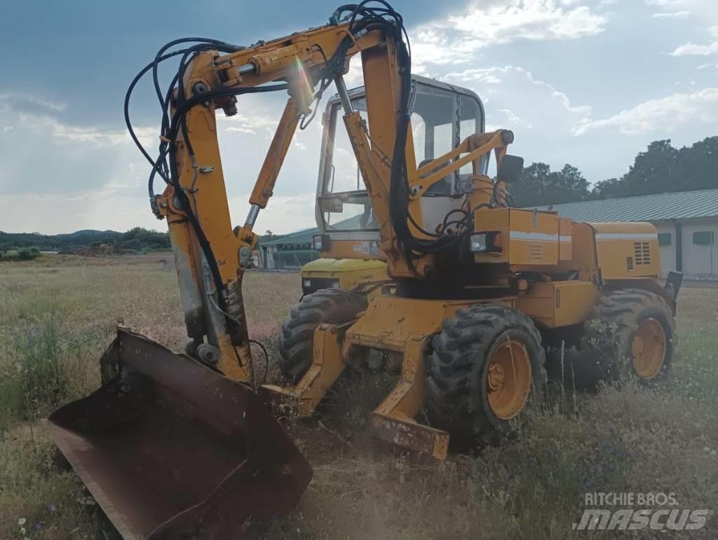 Mecalac 11 CX Bageri točkaši