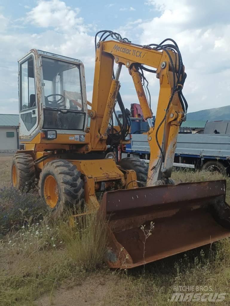 Mecalac 11 CX Bageri točkaši