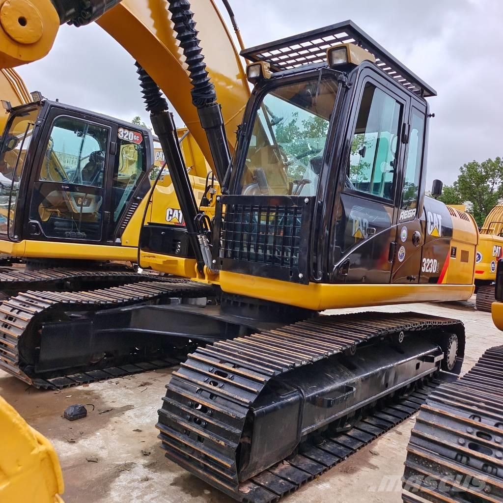 CAT 323 D Bageri guseničari
