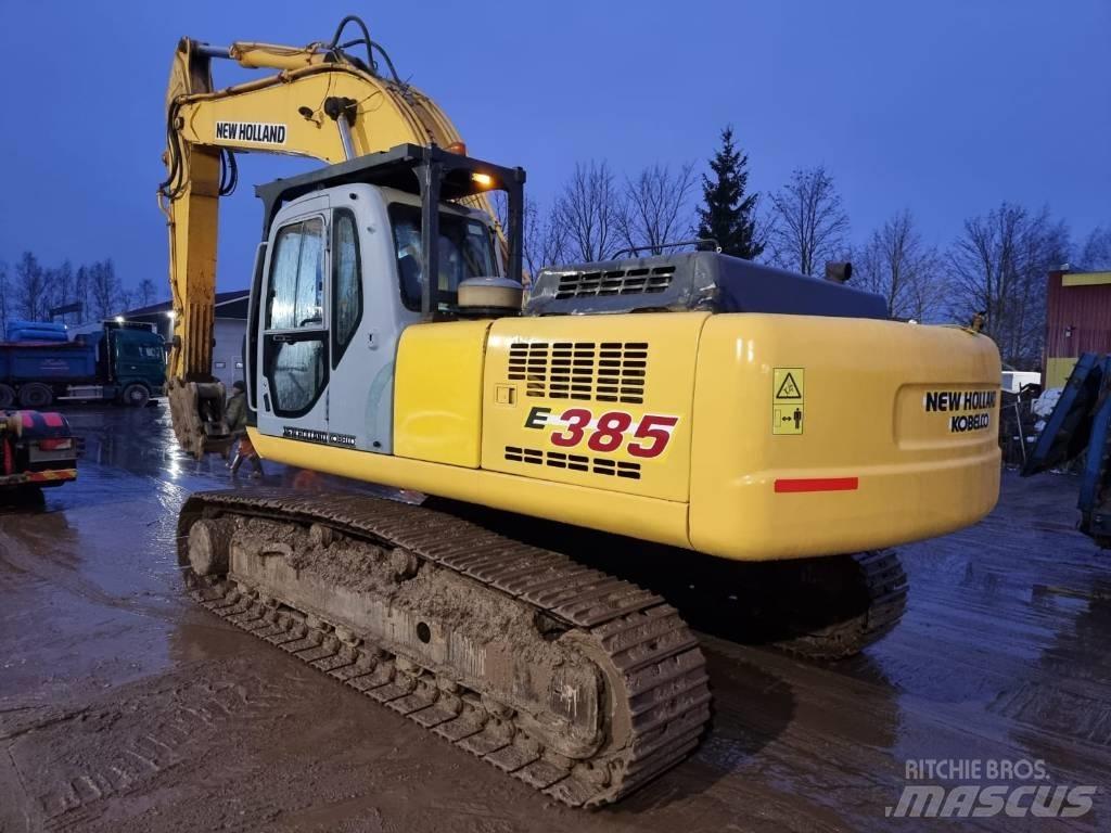 New Holland E 385 Bageri guseničari