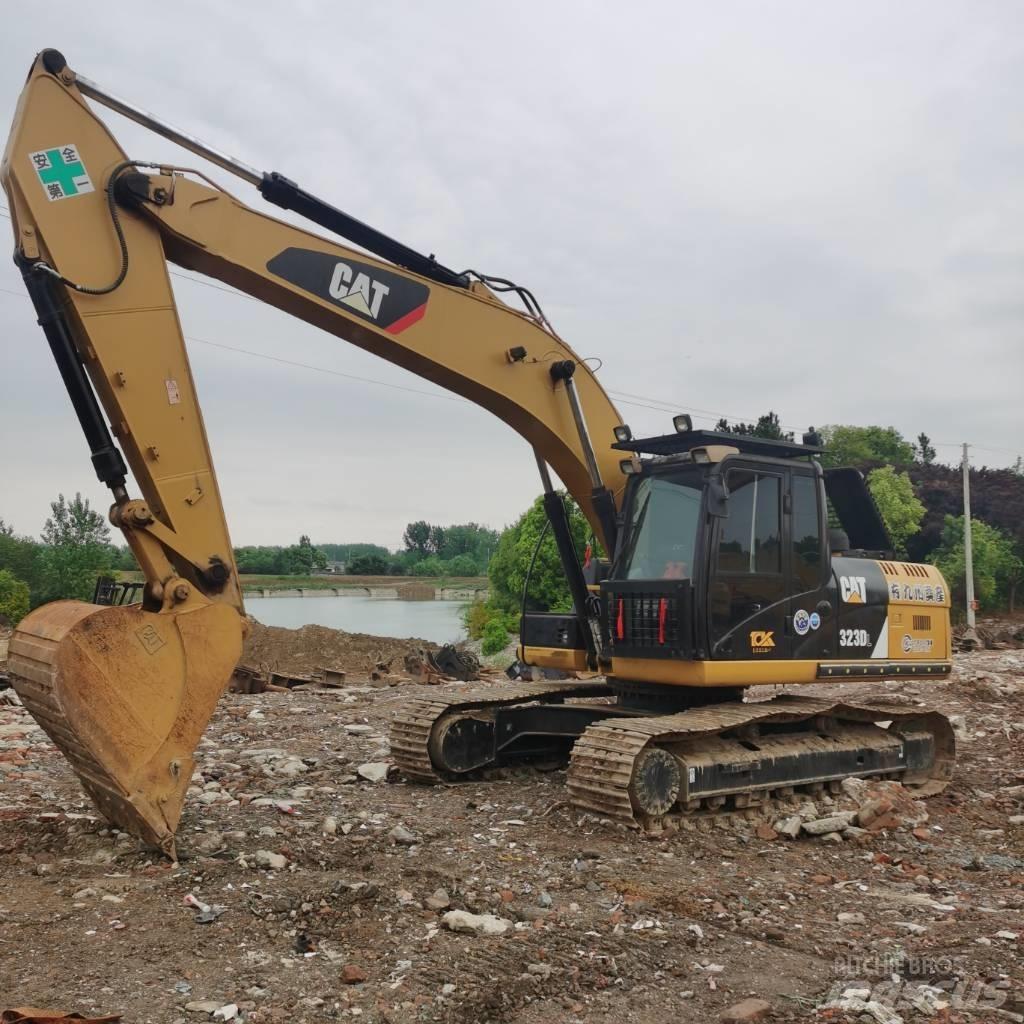 CAT 323DL Bageri guseničari