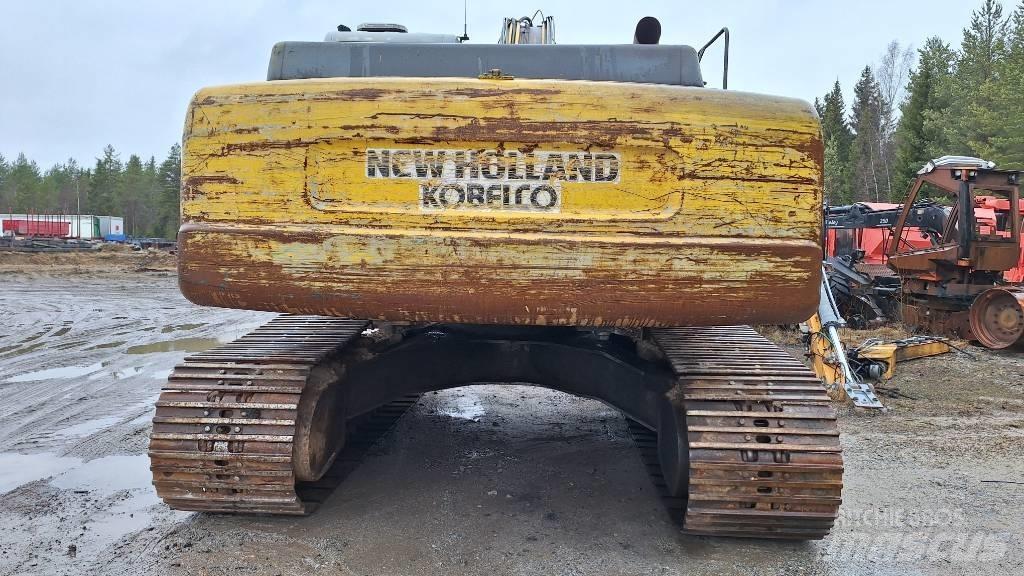 New Holland E 305 Bageri guseničari