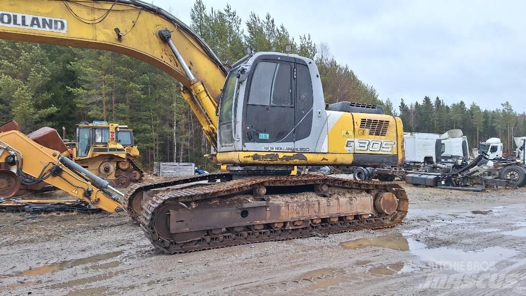 New Holland E 305 Bageri guseničari