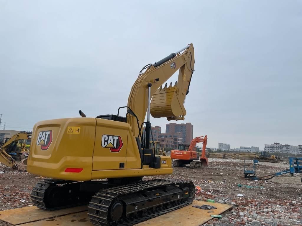 CAT 323GC Bageri guseničari