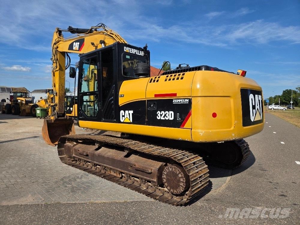 CAT 323DL Bageri guseničari