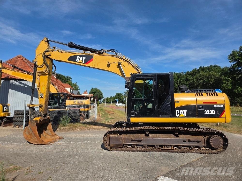 CAT 323DL Bageri guseničari