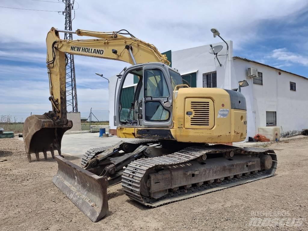 New Holland E 235 SR Bageri guseničari