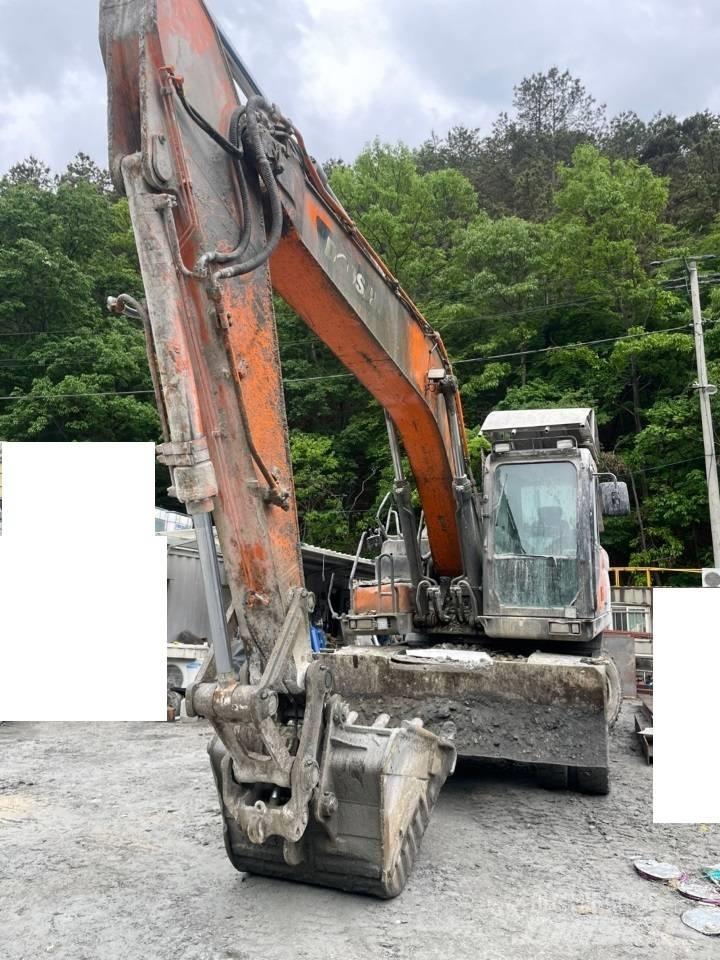 Doosan DX 210 W Bageri točkaši