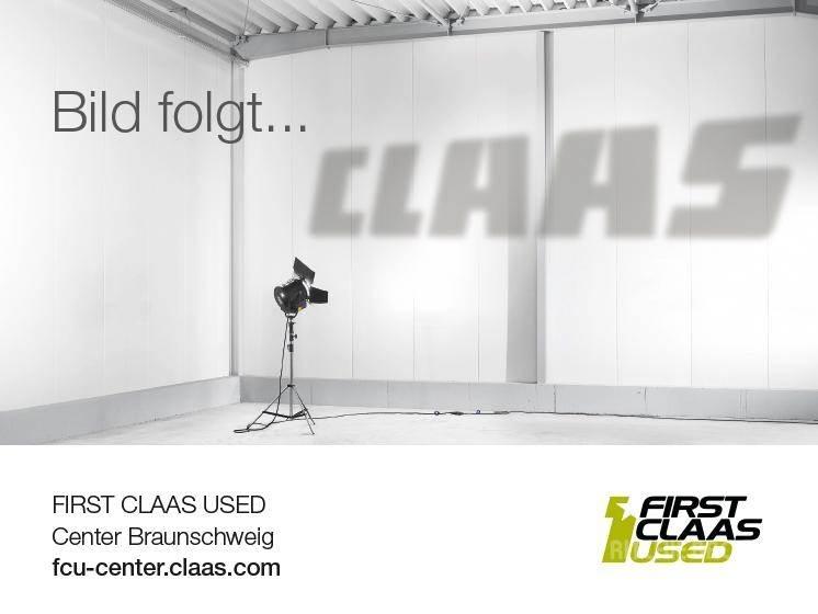 CLAAS AXION 810 Traktori