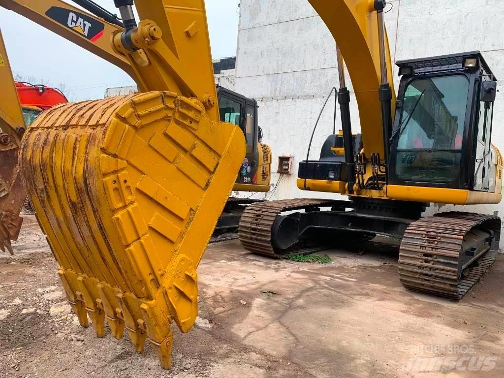 CAT 323 D L Bageri guseničari