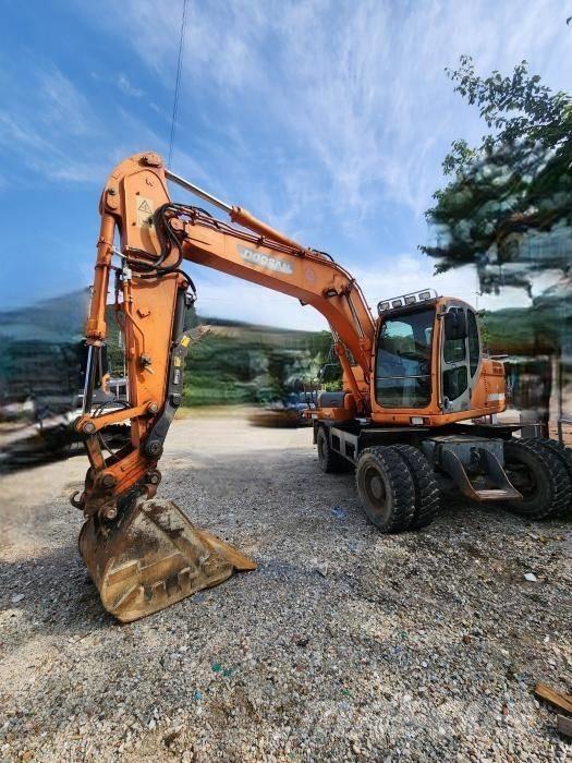Doosan DX 140 W Bageri točkaši
