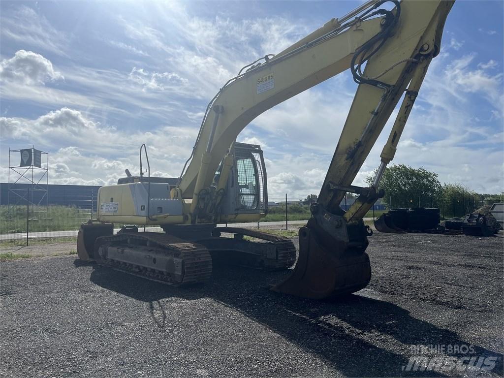 New Holland E 265 B Bageri guseničari
